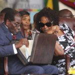 Mugabe was so afraid of a coup he always travelled with a suitcase full of cash