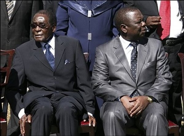 Mugabe-and-Tsvangirai-look-side-ways-600