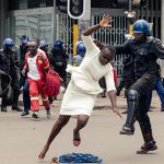 Zimbabwe police use tear gas, batons to disperse opposition supporters