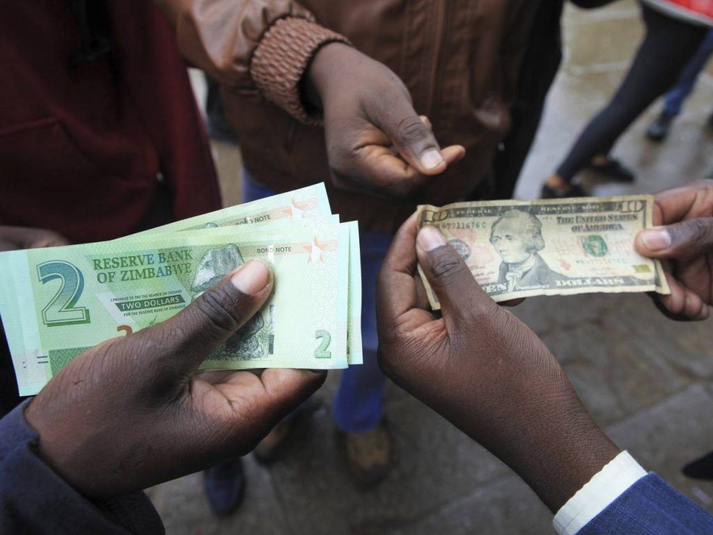 Zimbabwe banks urge periodic devaluation of dollar
