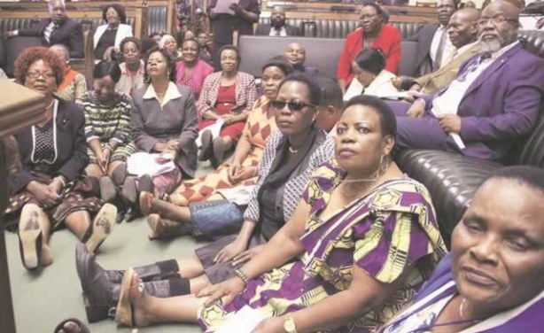 women legislators sitting in parliament